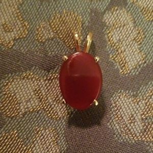14kt pendant. Red Stone.Possibly ruby or carnelian